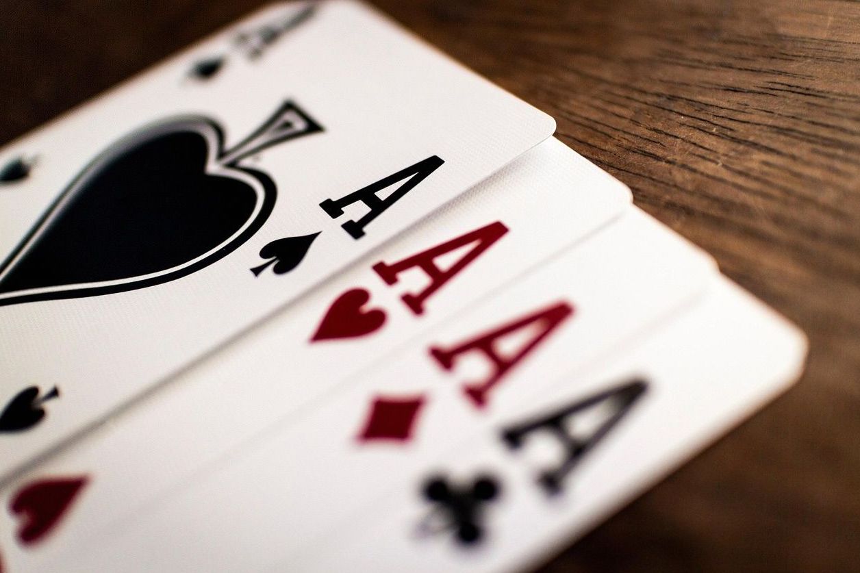 Poker chips and cards on table at Joyfuldays